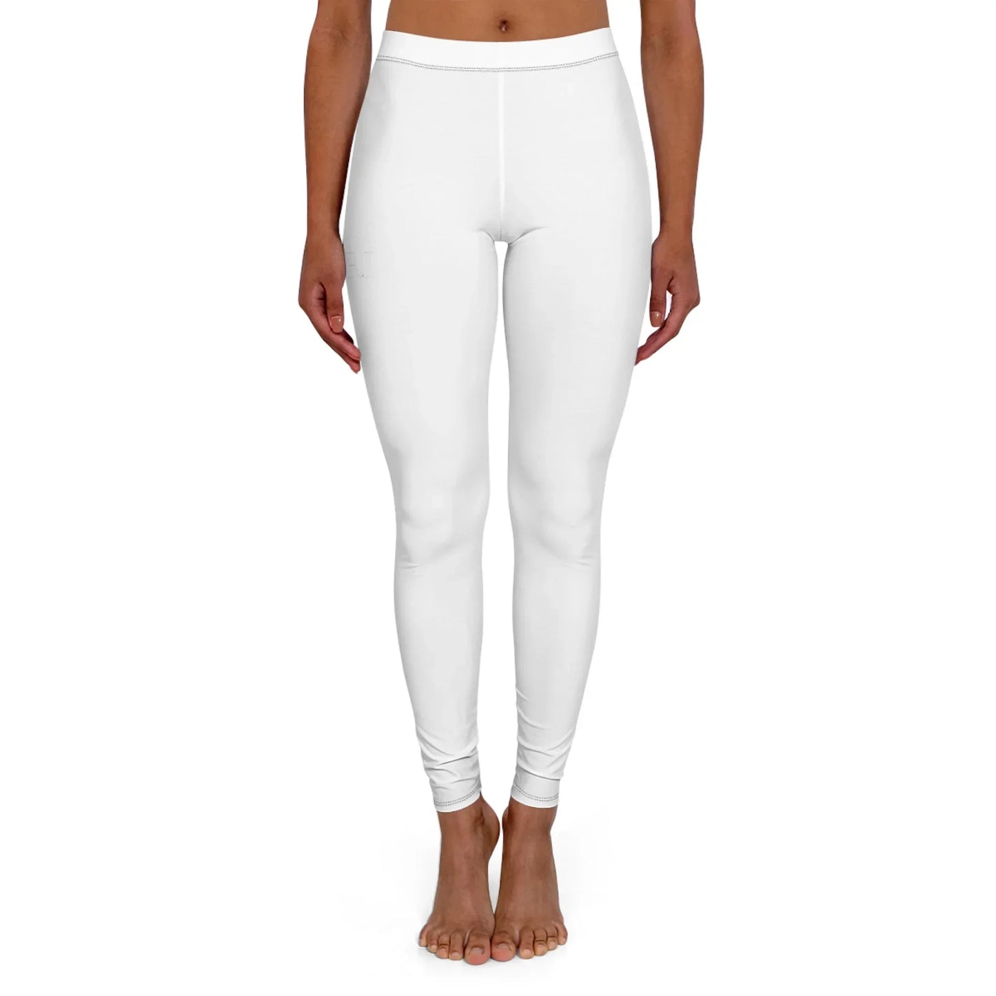 Front view of woman wearing plain white leggings on a white background