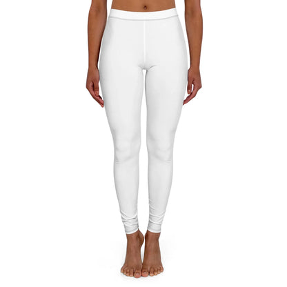 Front view of woman wearing plain white leggings on a white background